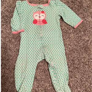 9 month zip up sleeper with ruffle on the back